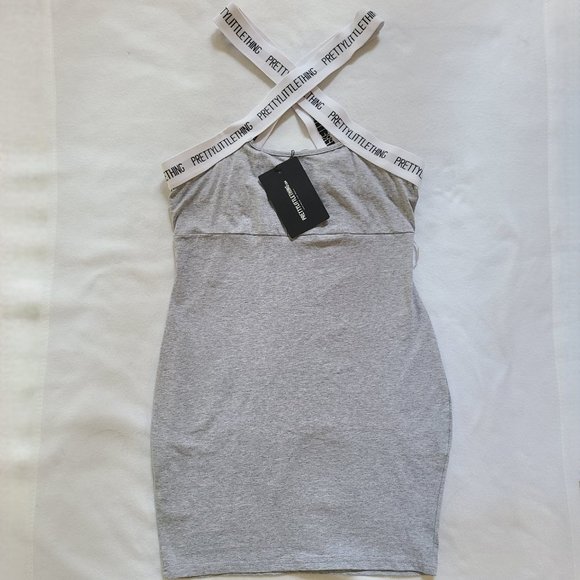 PrettyLittleThing | Dresses | Nwt Pretty Little Thing Grey Stretch Jersey  Logo Cross Strap Bodycon Dress Mini | Poshmark